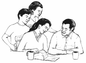 I assume they're laughing at a picture of a "stereotypical" family in the book they're all reading.